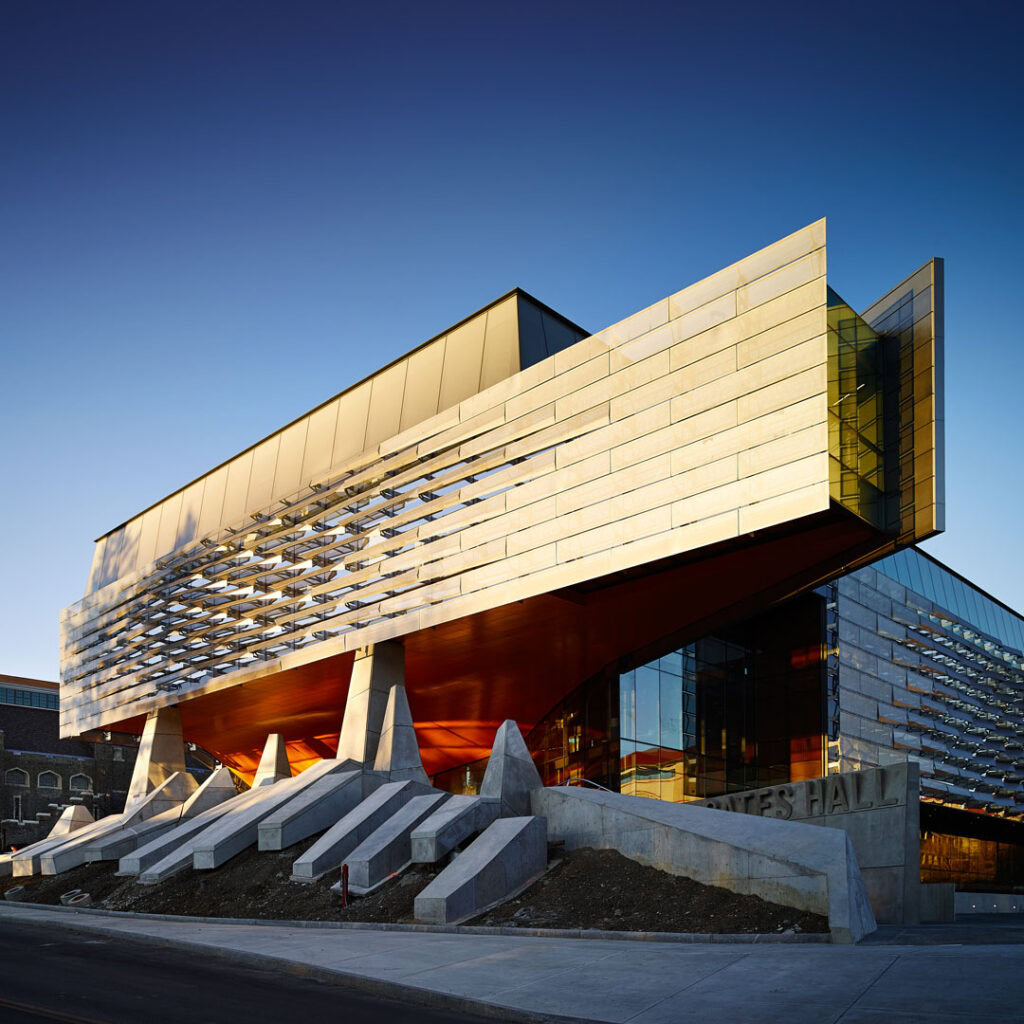 Contemporary architectural building with YKK branding and innovative design.
