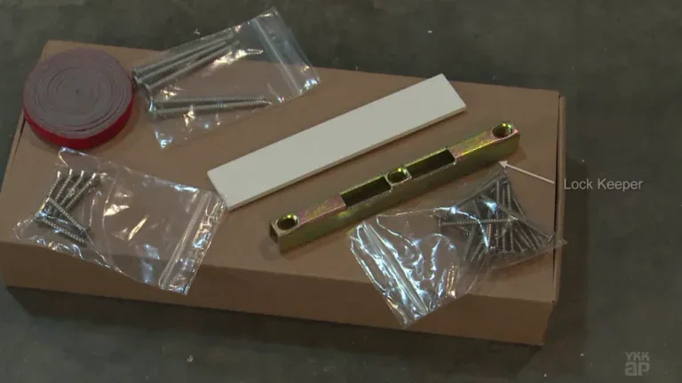 YKK window lock hardware with screws and mounting strip for secure installation.