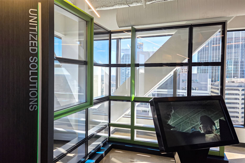 YKK modular glass window display showcasing innovative building solutions.