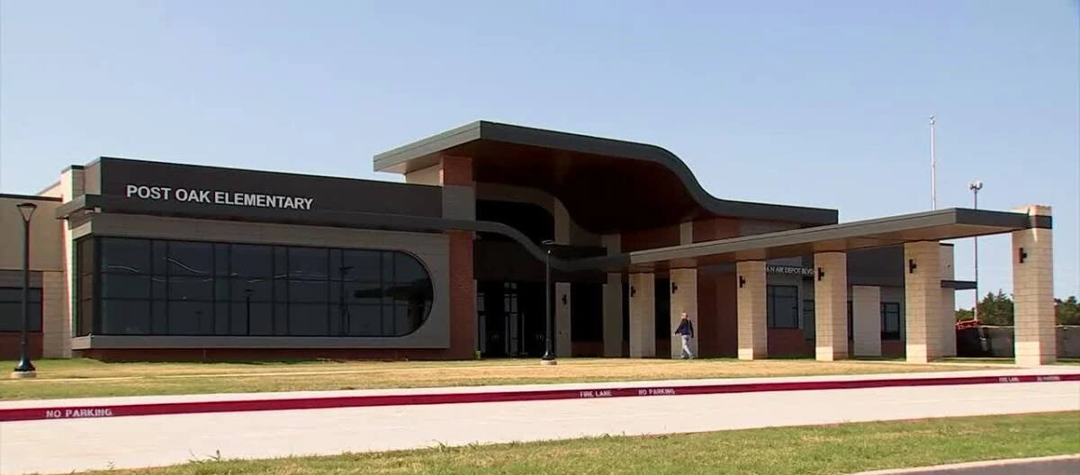 Post Oak Elementary School building with modern architecture and large glass fac.